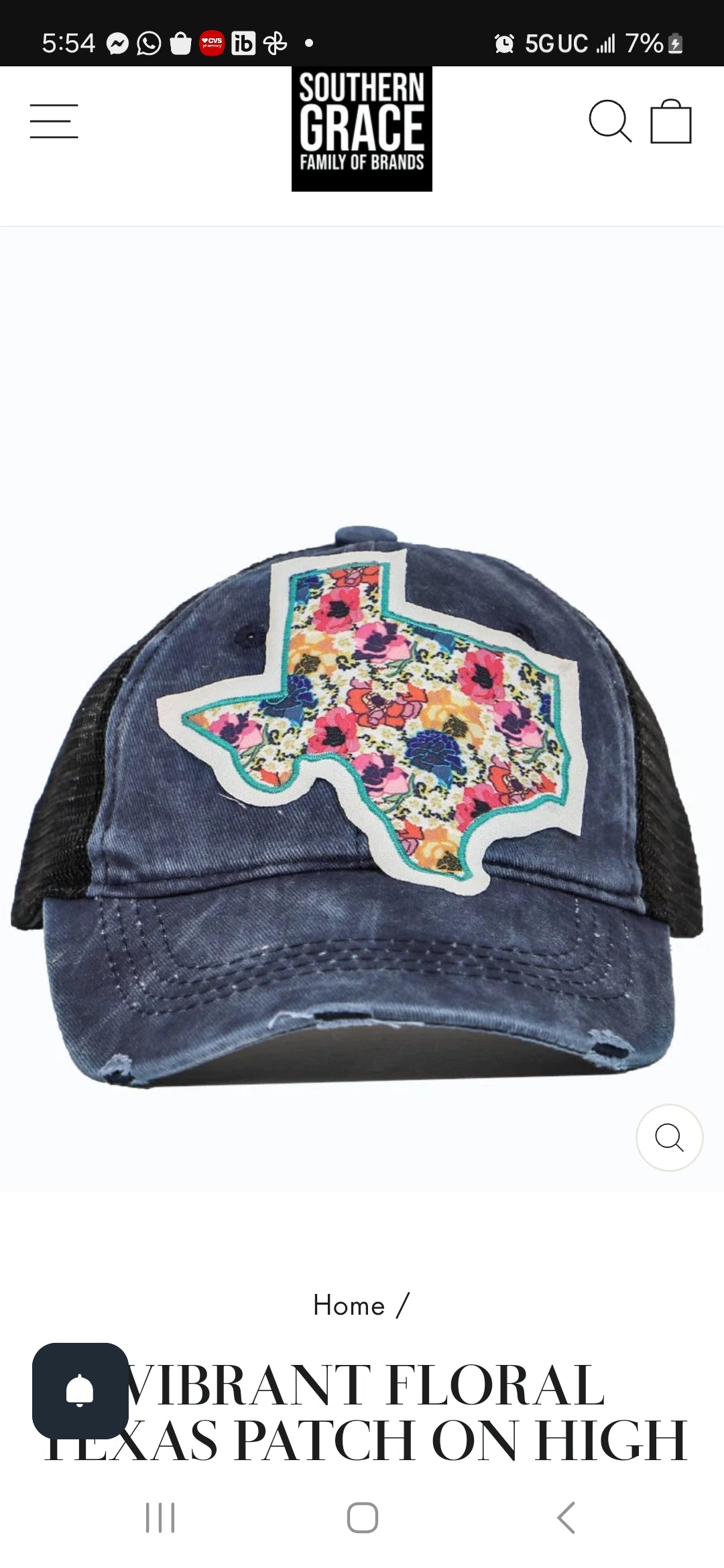 VIBRANT FLORAL TEXAS PATCH ON HIGH PONYTAIL NAVY BLUE HAT WITH BLACK MESH