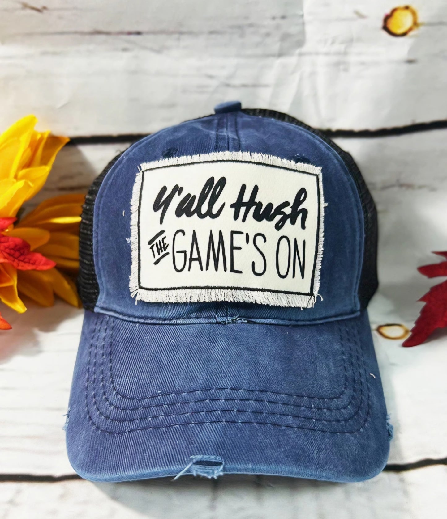 Y'ALL HUSH THE GAME'S ON PATCH ON HIGH PONYTAIL NAVY BLUE HAT WITH BLACK MESH