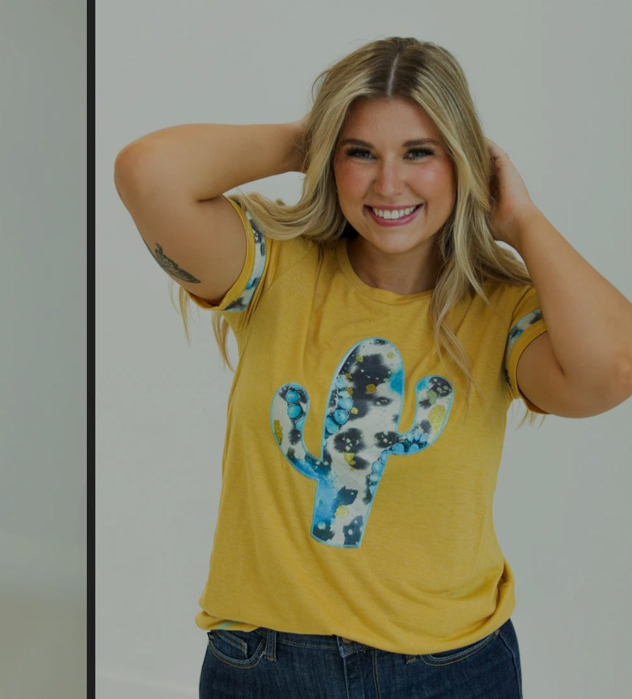 CACTUS AND TURQUOISE ON MUSTARD TEE WITH COWPRINT