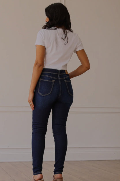 THE PARIS HIGH RISE DARK WASH SKINNY JEAN